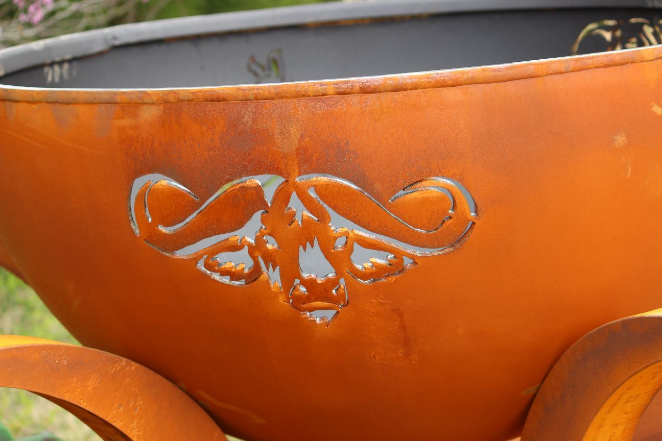 The Big Five Stainless Steel Fire Pit, Displaying a Cutout of a Ram.