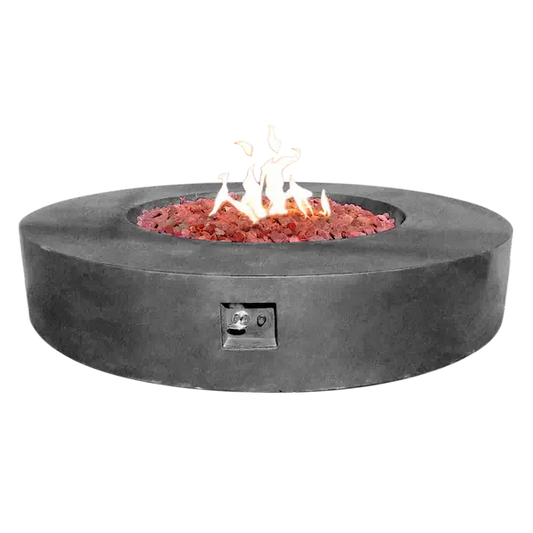 The Coliseo Concrete Cylinder Fire Pit 02 in the Graphite color option. Displayed with a beautiful warm flame, on a white background.