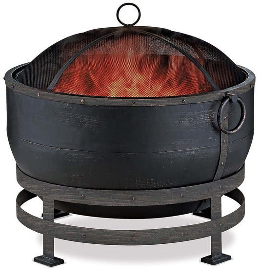The Oil Rubbed Bronze Wood Burning Outdoor Firebowl with Kettle Design, Displayed with a warm flame on a white background.