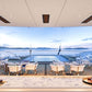 Luxury yacht deck with pool, chairs, and views of the ocean, using the bromic marine heater