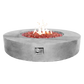 The Coliseo Concrete Cylinder Fire Pit 02 in the Natural Concrete color option. Displayed with a beautiful warm flame, on a white background.